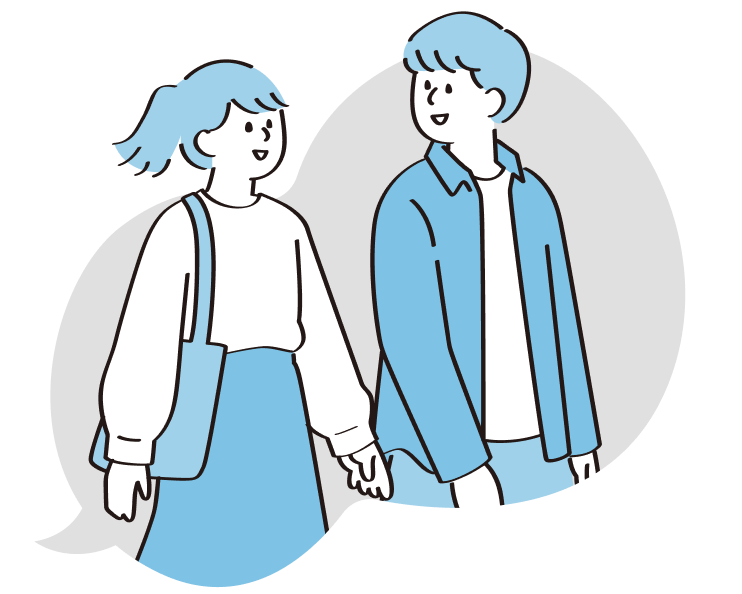 手をつないで歩く2人の学生のイラスト